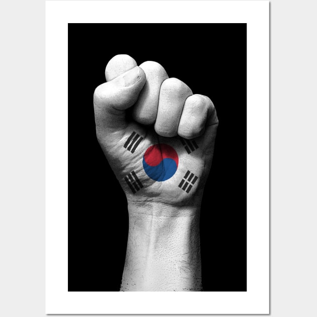 Flag of South Korea on a Raised Clenched Fist Wall Art by jeffbartels